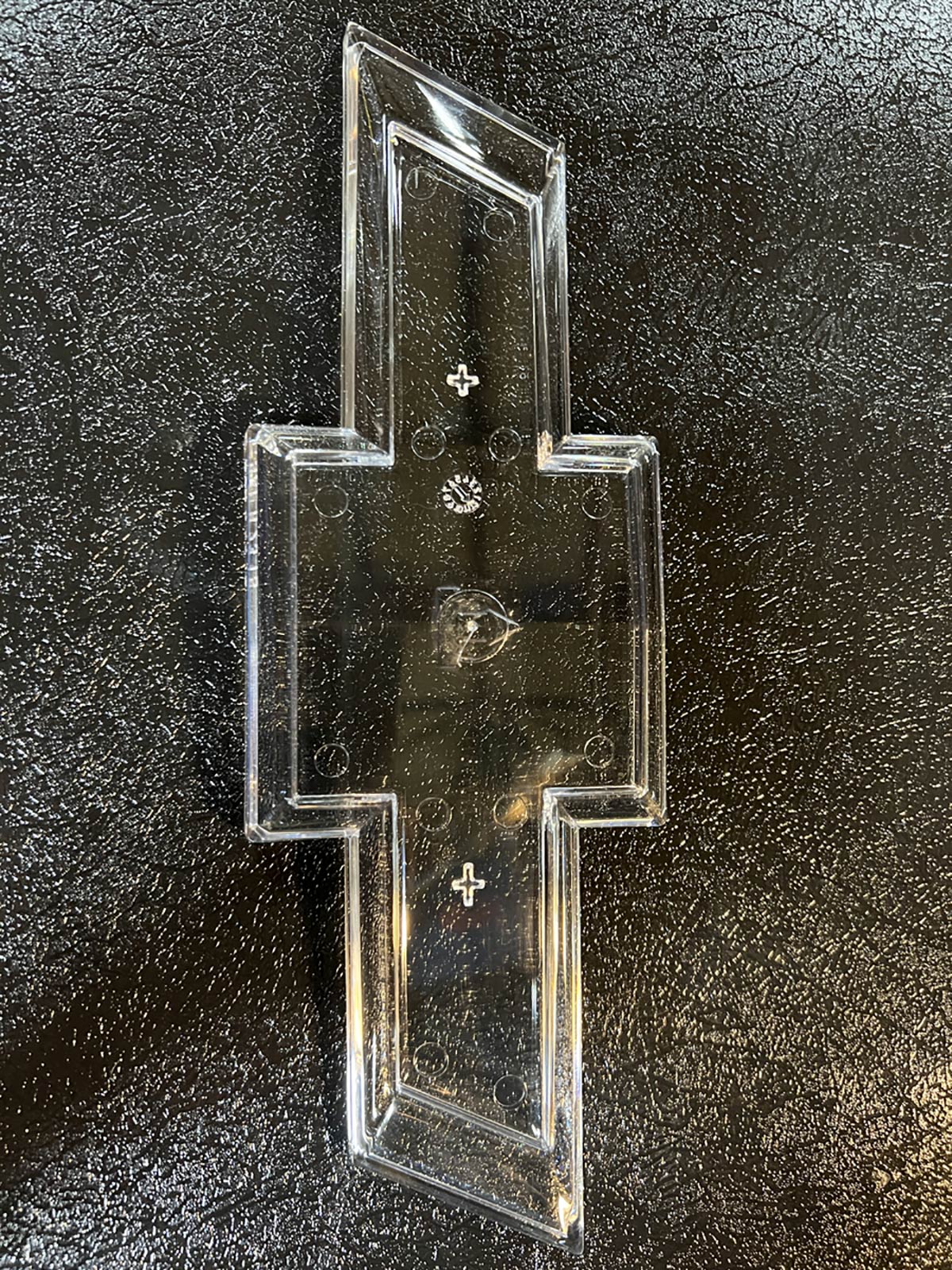 automotive part - clear plastic injection molded chevy emblem